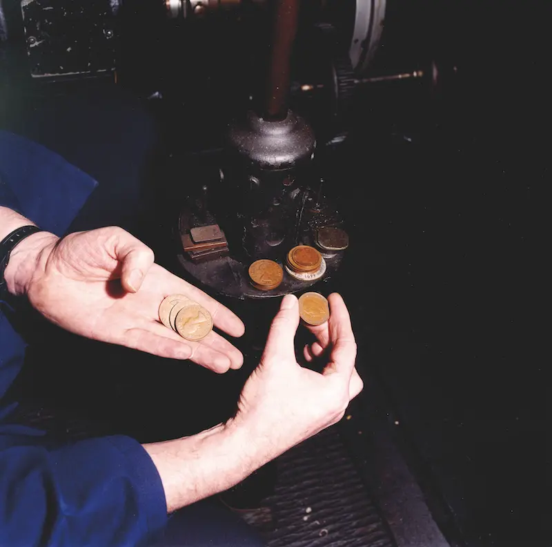 Pre decimal pennies used by clock mechanics